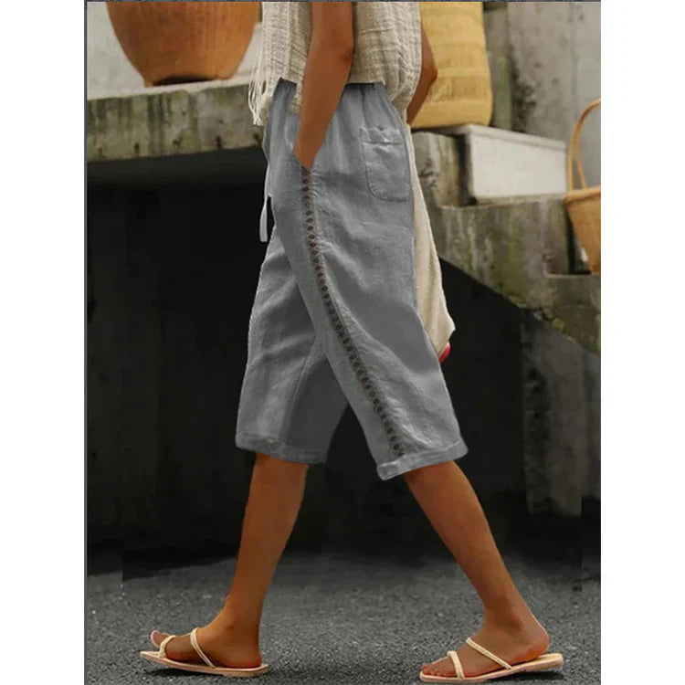 Summer trousers in capri length for women with lace details